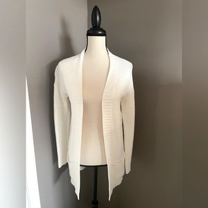 White Express knit sweater.